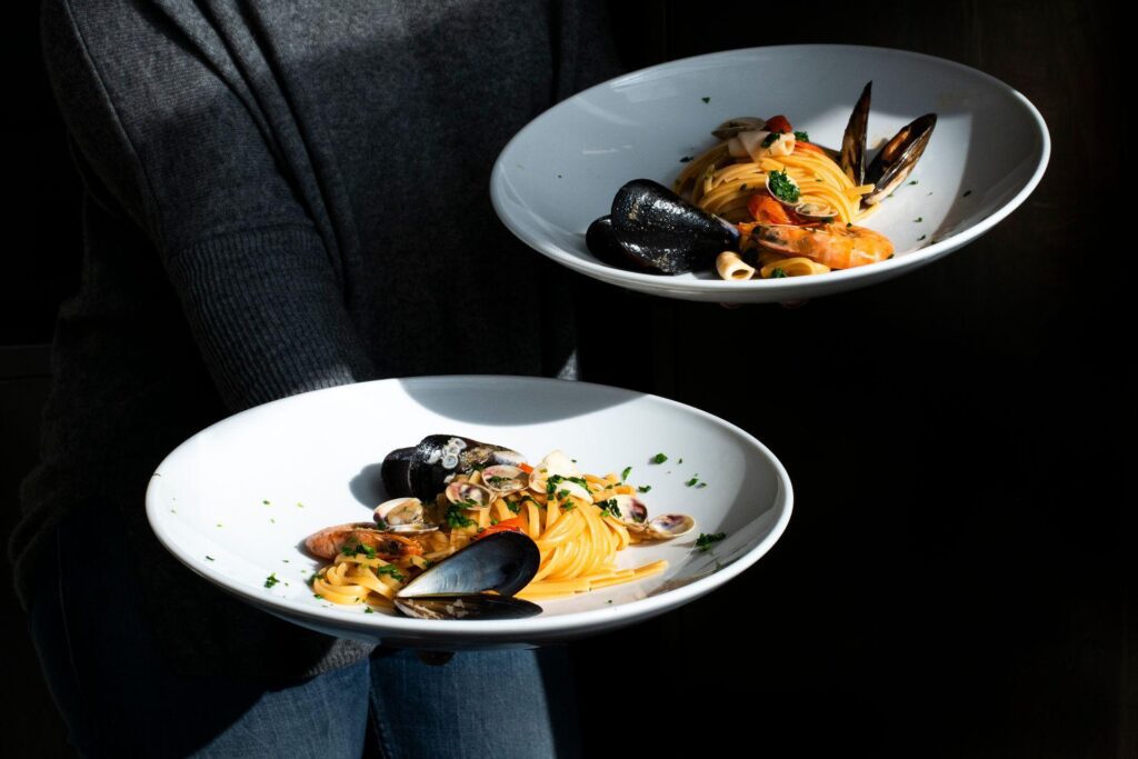 Seafood pasta served at a restaurant table