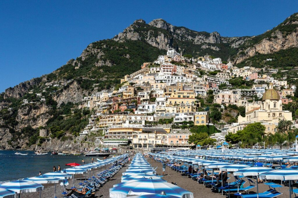 Positano coastline with colourful houses overlooking the beach and Mediterranean Sea
